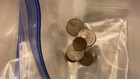 Place A Bag Weighed Down With Coins Over Your Drains