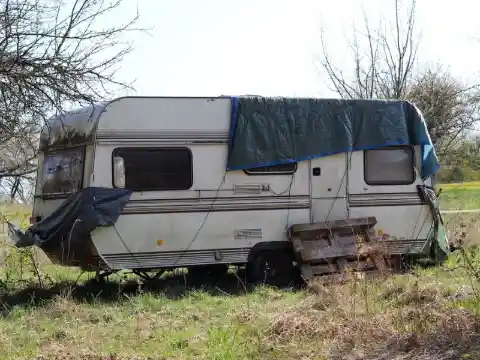 woman opens the door