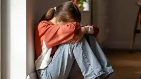 Standing By Her Daughter